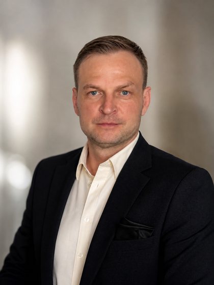 Andrei Komissarov, President of AXIOM COSMETICS INC.